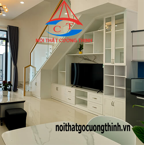 Thiết kế tủ kệ gầm cầu thang gỗ phòng khách sang trọng tối ưu diện tích