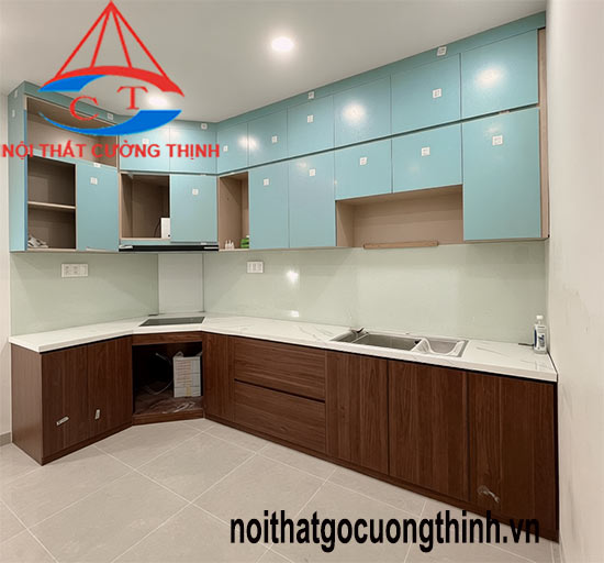 Mẫu tủ bếp hiện đại acrylic trắng góc L sang trọng