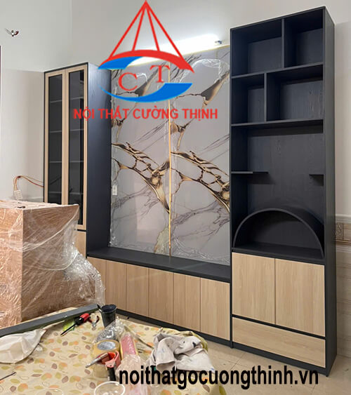 Mẫu tủ kệ tivi phòng khách kèm vách gỗ công nghiệp đẹp
